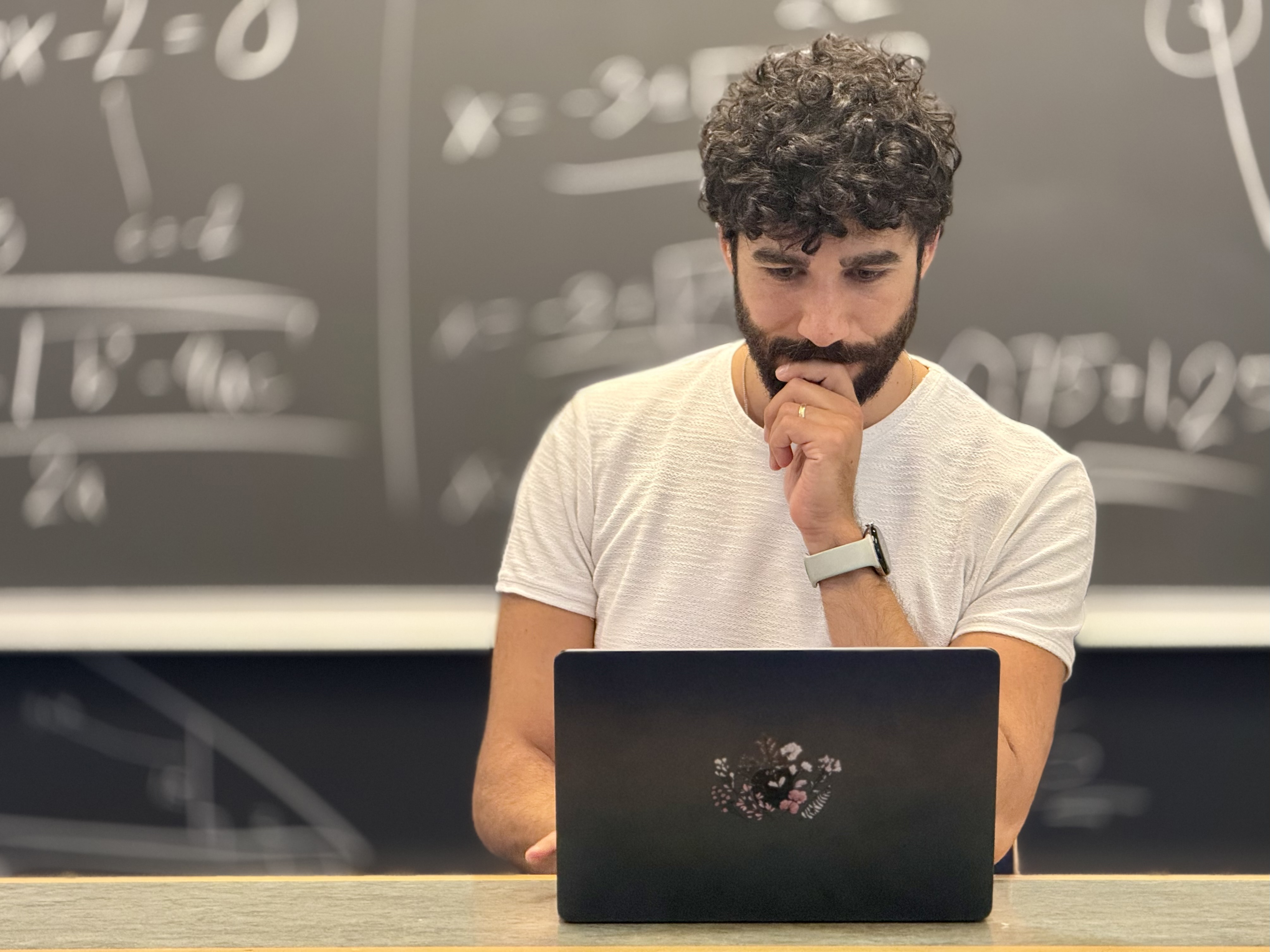 Jonatan Kara working at a computer