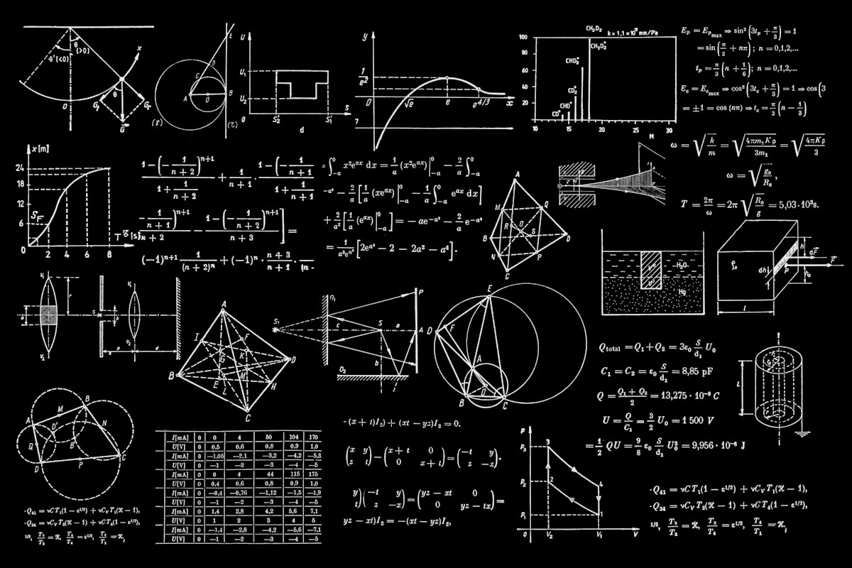 Student working through mathematics problems at a desk