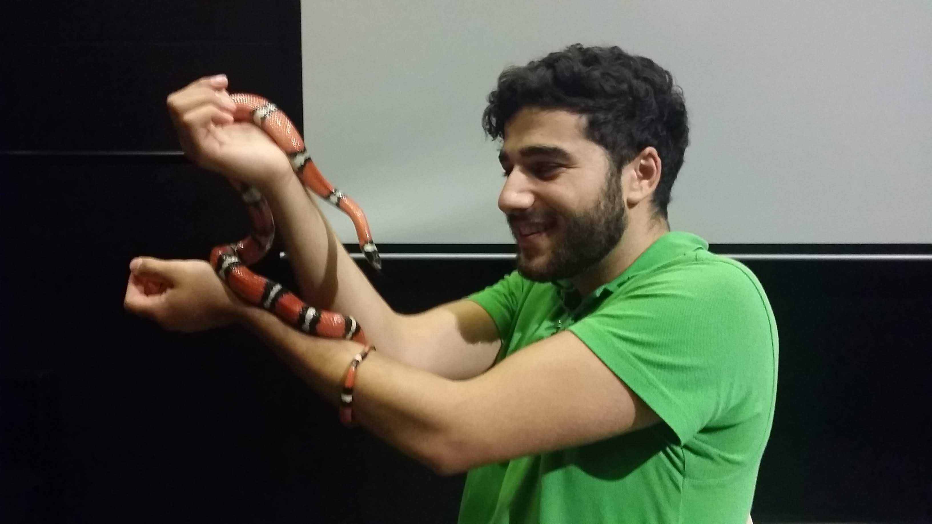 Jonatan holding a snake